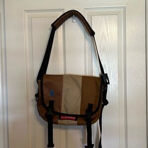 Timbuk2 XS messenger bag, brown and tan, red interior